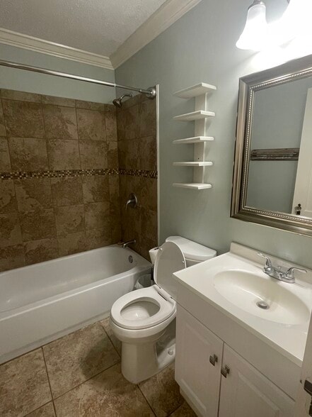 1 Full Bathroom with ceramic shower wall tile and floors - 2415 Old North Hills St