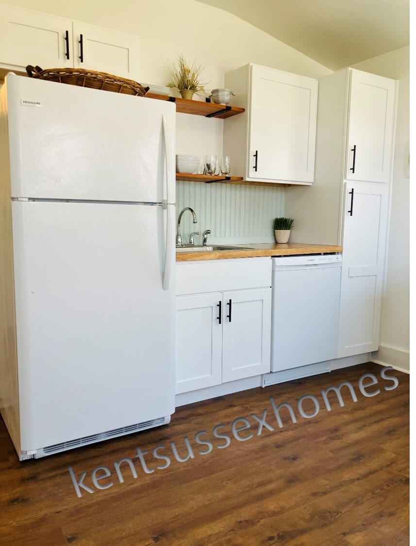 Newly remodeled kitchen with slow close cabinets and butcher block countertops - 112 Mechanic Street