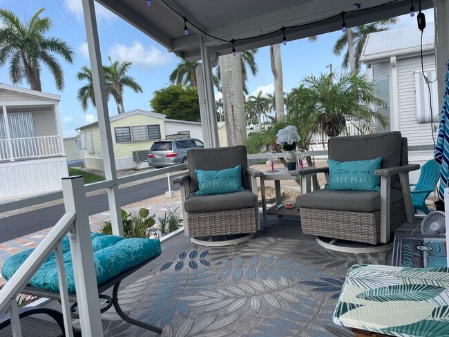 Beautiful palms and landscaping - 16300 Pine Ridge Rd