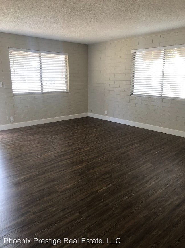 Building Photo - 6027-6041 N 23rd Ave