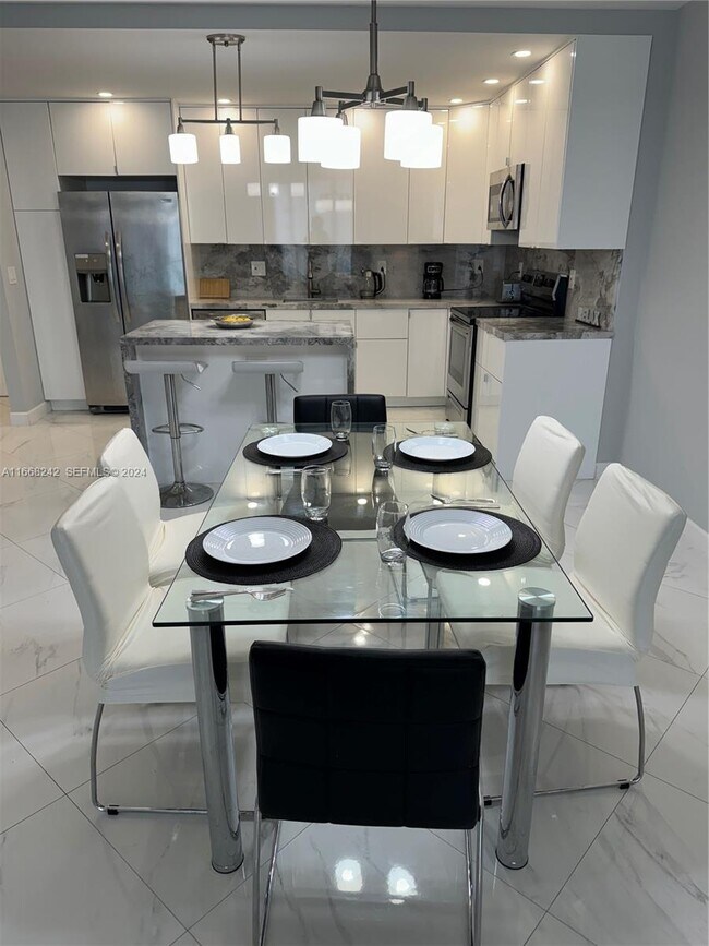 Building Photo - 19370 Collins Ave