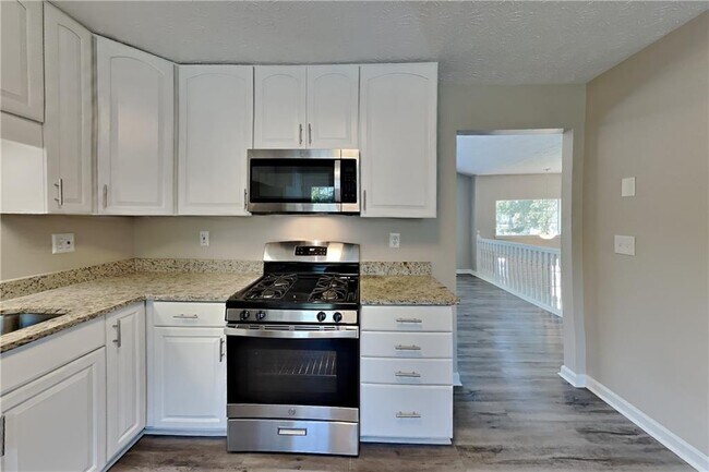 Building Photo - 4504 Rushing Wind Ct