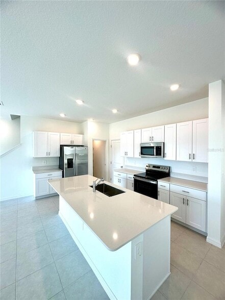 Building Photo - 8795 Coqui Song Ln