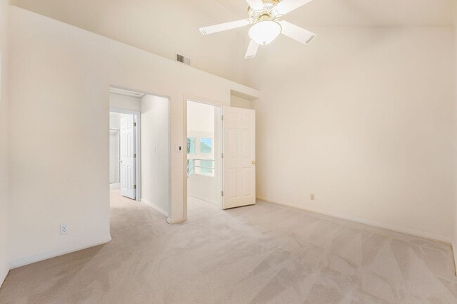 Building Photo - Charming Guard-Gated Southwest Las Vegas Townhome with Fireplace & Golf Course Views!