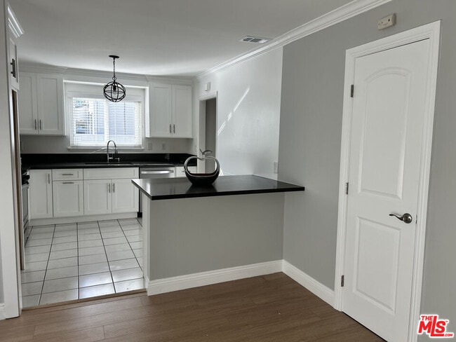 Building Photo - 6448 Lubao Ave