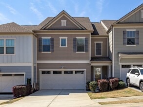Building Photo - **MOVE IN SPECIAL! 50% off first month's rent!!** Spacious 4BR Townhouse with 2-Car Garage Near D...