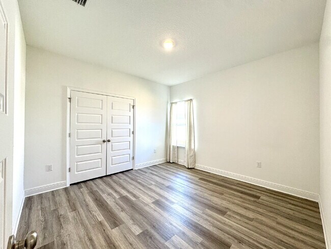Building Photo - This gorgeous new construction home in Ward Creek overlooks a protected nature preserve.