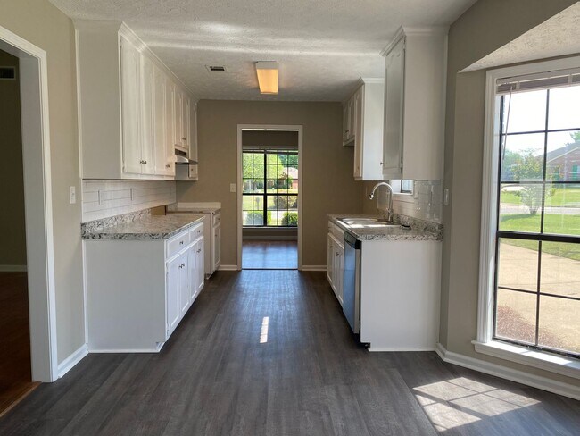 Building Photo - Charming 3-Bedroom Brick Home with Modern ...