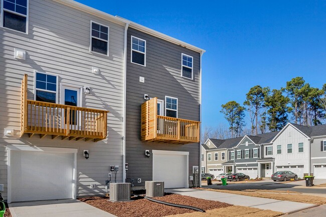 Building Photo - BRAND NEW TOWNHOME Available now, Depot 49...