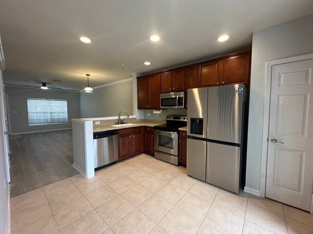 Building Photo - Stunning Townhome With Pond View In Gated Community