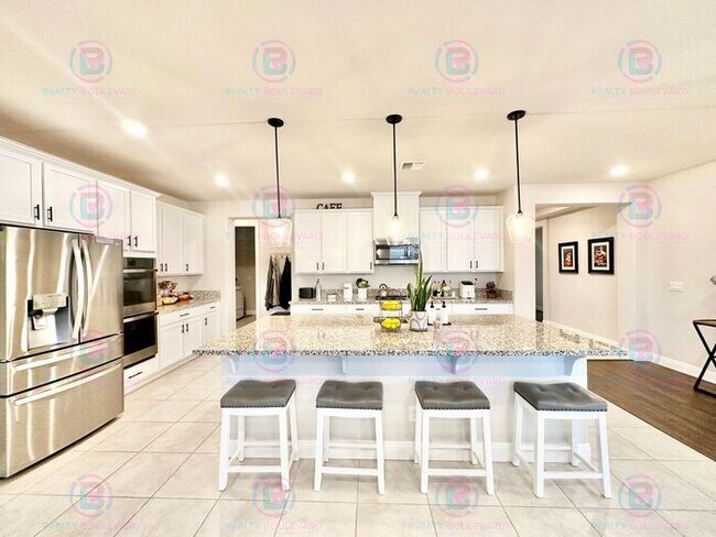 Building Photo - Welcome to your dream home, where modern elegance meets unparalleled convenience!