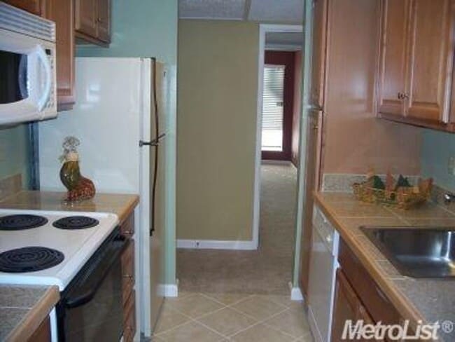 Building Photo - Lower-Level Condo in Gated Timberlake, The...