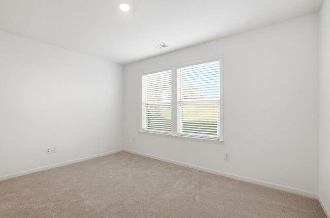 Building Photo - Brand-New Townhome in the University area at Senata at Research Park!