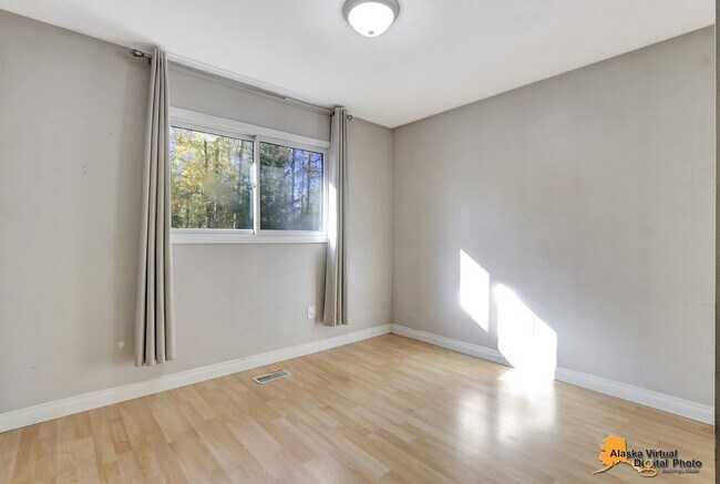 Building Photo - Eagle River Home w/ Fenced Yard, Sunroom, and Garage!