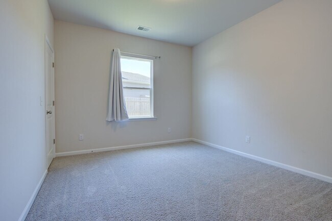 Building Photo - Spacious 4BR Rental with Stunning Kitchen & Covered Patio