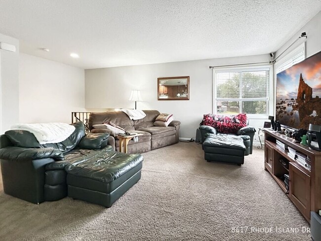 Building Photo - 8417 Rhode Island Dr N