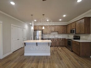 Building Photo - EP 6 | Townhome with Garage in Siloam Springs!