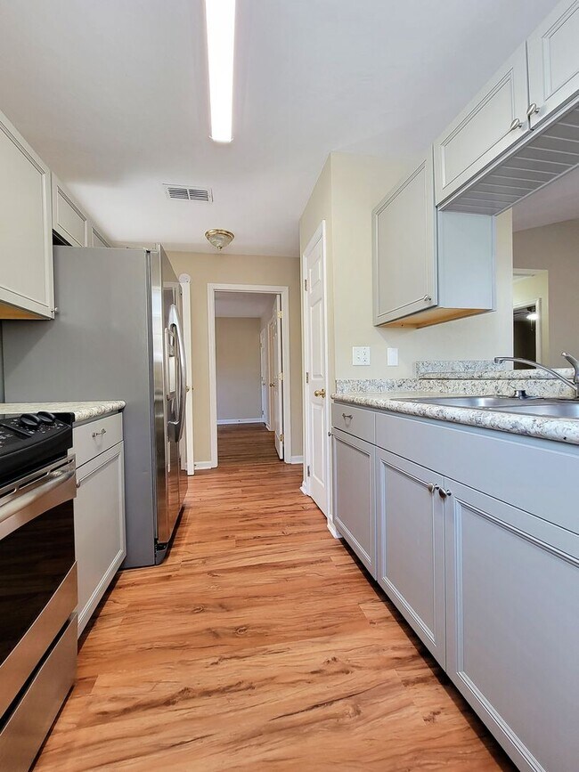 Building Photo - 2 bedroom duplex for rent right away off E Mahan, wood floors and fireplace for $1450 per month