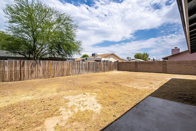 Building Photo - Updated home with large backyard & 2 car g...