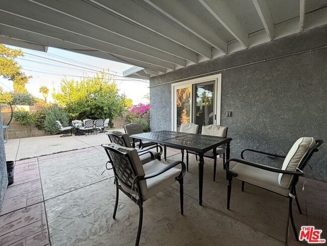 Building Photo - 10824 Paso Robles Ave