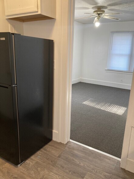 View from kitchen into living/bedroom - 512 S Broadway