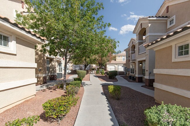 Building Photo - Three bedroom unit in gated community with...