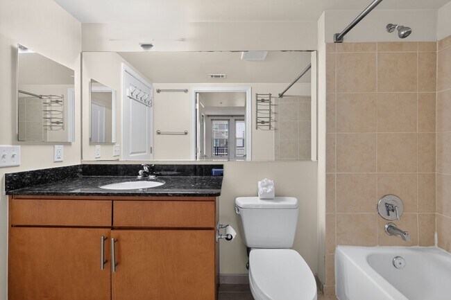 Building Photo - Penn Quarter 1BR Condo with Balcony, Garage Parking, Storage, Concierge, and Rooftop Deck.
