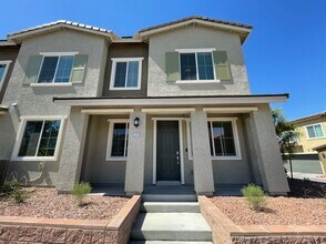 Building Photo - GATED 3 BED 3 BATH 2 CAR GARAGE TOWNHOUSE w/ LOFT + ROOM DOWNSTAIRS & COMMUNITY POOL IN HENDERSON