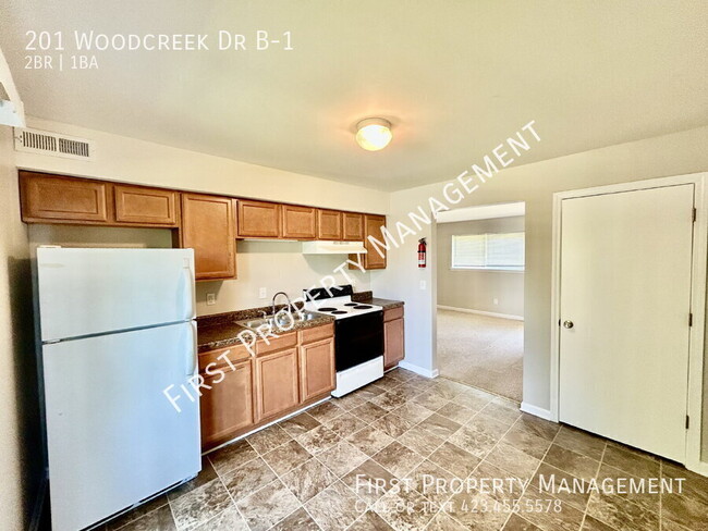 Building Photo - 201 Woodcreek Dr
