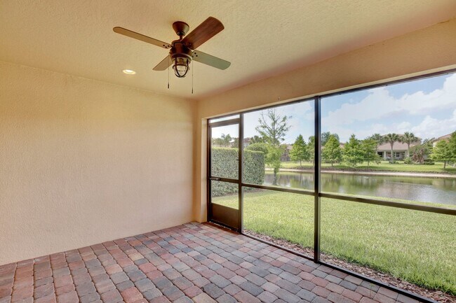 Building Photo - Gorgeous 2/2 + Den Mediterranean Villa with Waterfront Screened Patio and 2-Car Garage in the Pre...