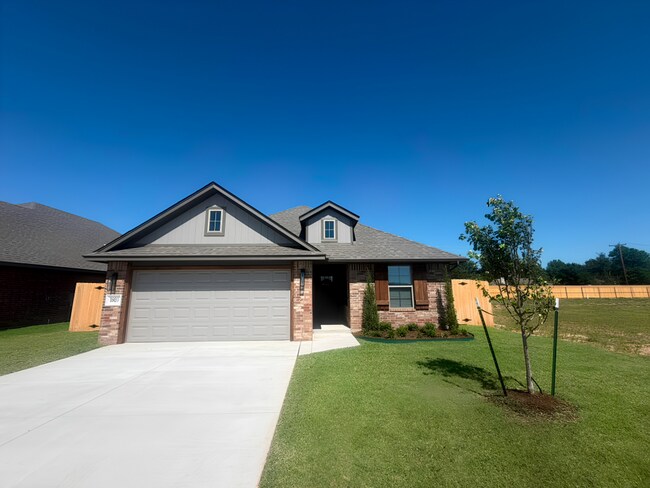 Building Photo - Spacious 4-Bedroom Home with 3-Car Garage in Yukon!