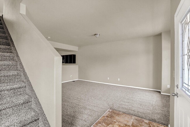 Building Photo - Modern Townhome with Central A/C, 2-Car Ga...