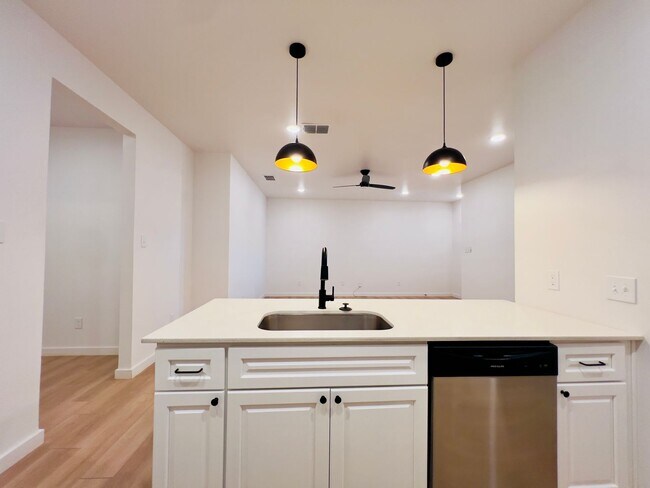 Building Photo - PRE-LEASING FOR AUGUST! Spacious 3-Bedroom Townhouse Near Texas Tech