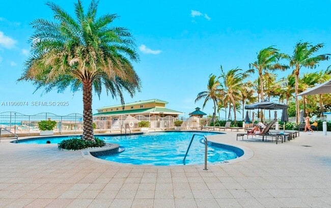 Building Photo - 16699 Collins Ave