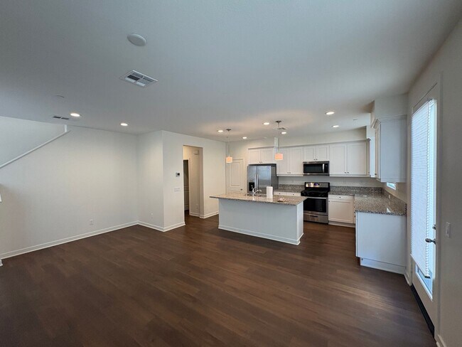 Building Photo - Spacious 3-Bedroom Townhome with Garage and Solar