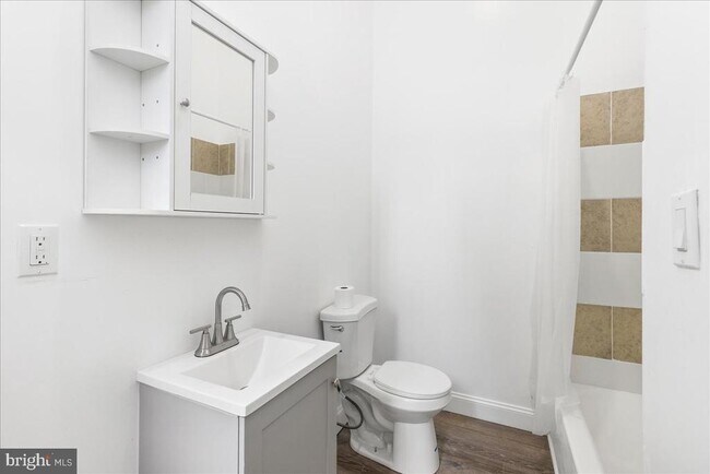 Building Photo - 6940 Woodland Ave