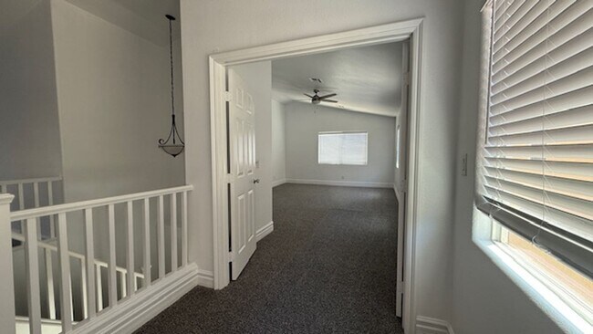 Building Photo - STUNNING 2 STORY HOME IN A GUARD GATED COM...