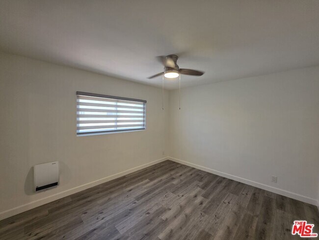 Building Photo - 10734 Palms Blvd