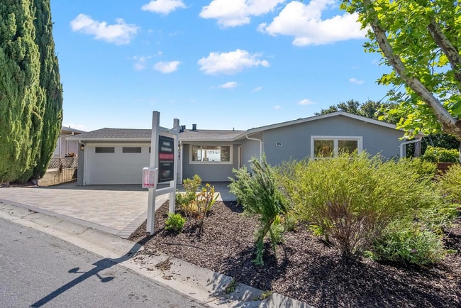 Building Photo - "Remodeled - Charming 3-Bed Sanctuary with...
