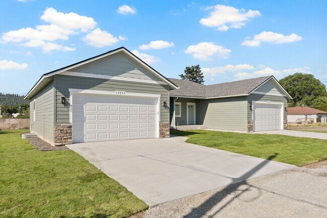 Building Photo - Newly built 4 Bedroom Duplex With Garage