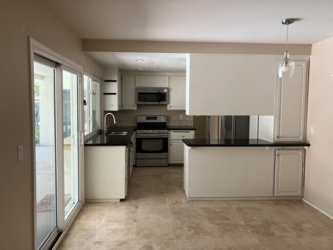 Kitchen viewed from Family Room - 282 Summit Rd