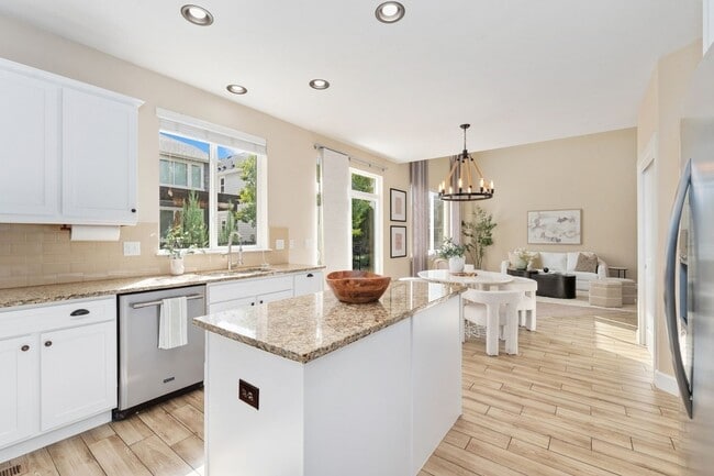 Building Photo - Evolve Real Estate: Evolve Real Estate: Meticulous Executive 4 Bedroom Plus Den Plus Finished Bas...