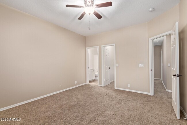 Building Photo - 1211 E Desert Flower Ln