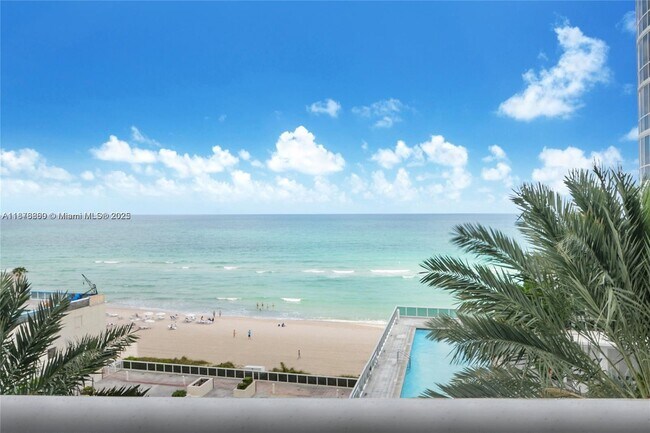 Building Photo - 15811 Collins Ave