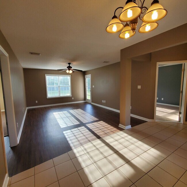Building Photo - Tranquil Oasis: Spacious 4BR Home with Mod...