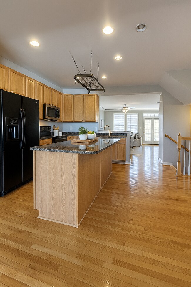 spacious open area kitchen with large kitchen island, electric stove, new dishwasher - 1518 montessori terrace