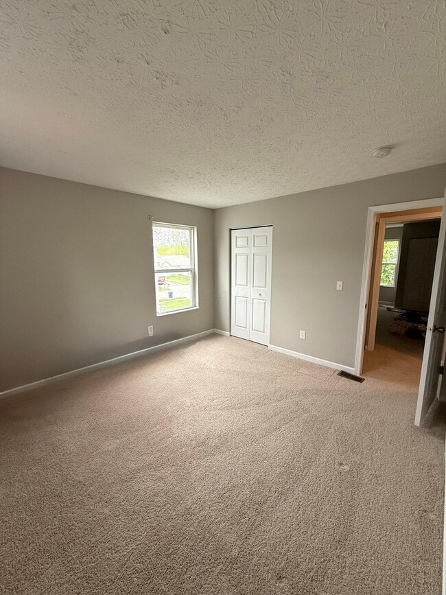 Building Photo - 6370 Bellinger Dr