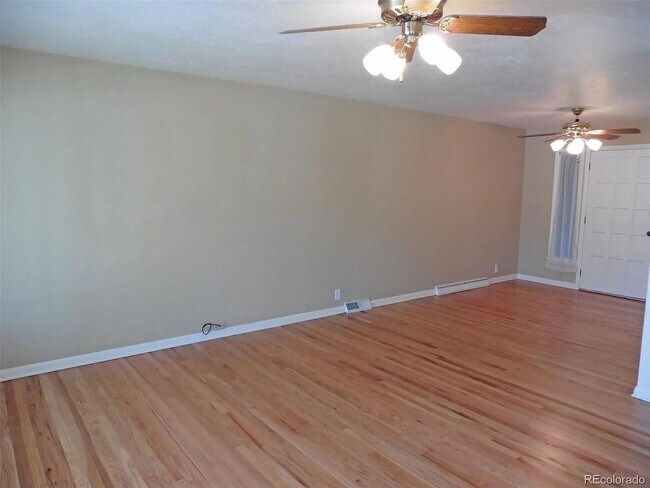 Building Photo - Spacious Littleton Home with Large Fenced Yard & Attached Garage!