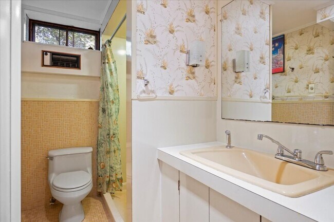 Building Photo - Elegant Multi-Level Brick Residence with Outdoor Oasis