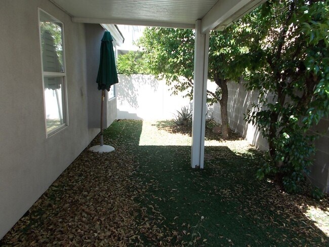 Building Photo - Charming Home in Gated Melrose Park Estates with Dual Fireplaces & Covered Patio